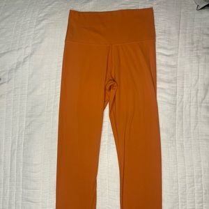 Nike DRI-FIT Orange high rise leggings in size Small